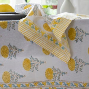 Lemon Cotton Hand Block Print Tablecloth | Lemon Cotton Hand Block Print Napkin | Stem Vases Asst Designs | Champagne Flute Etched in Green & Clear | Rustic Scalloped Pillar Candle Lemon